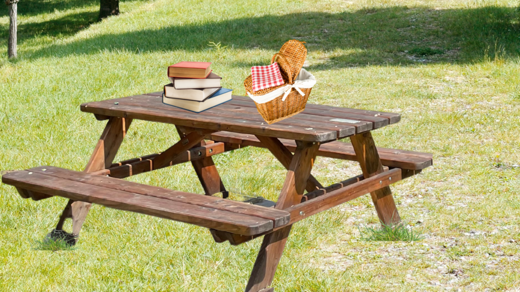 Four books and a picnic basket on a table as a welcome for all we visit The Most Interesting Books.